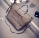 Rebellious Studded Soft Leather Clutch