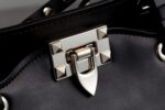 Rock-chic Studded Trapeze Genuine Leather Arm Bag