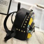 Vibrant Rainbow Studded Vegan Leather Backpack