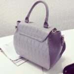 Elegant Embossed Genuine Leather Top Handle Bag