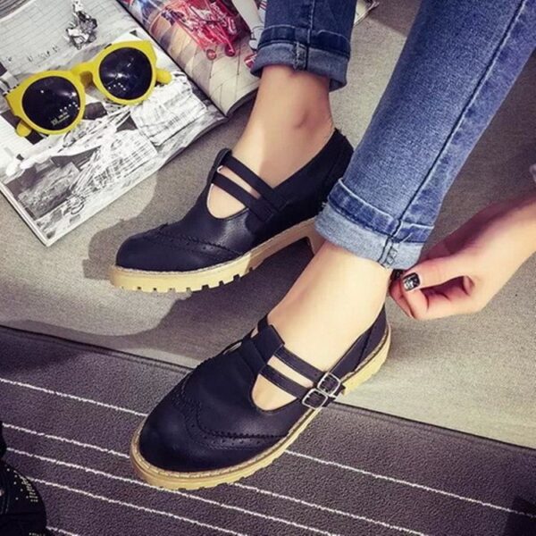 black buckled leather oxford