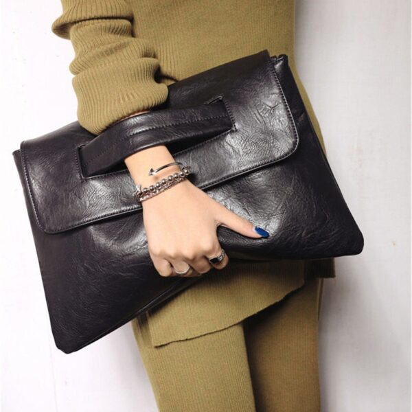black snap leather hand shoulder bag
