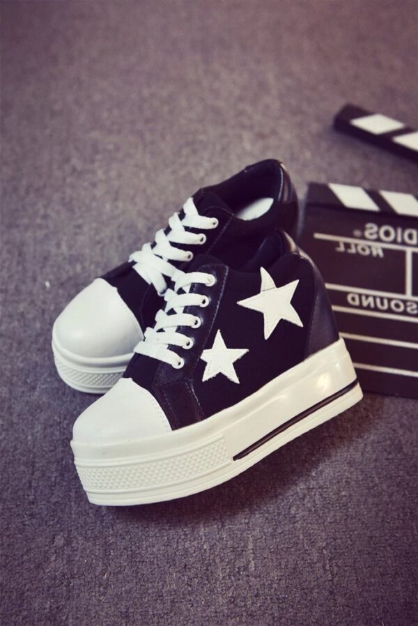 black starred high sole sneaker