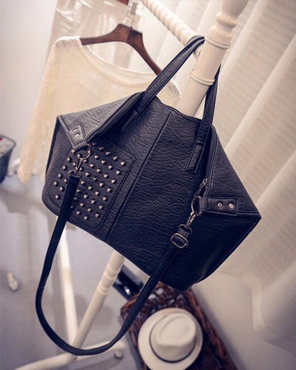 black studded rivet soft leather sleeve bag