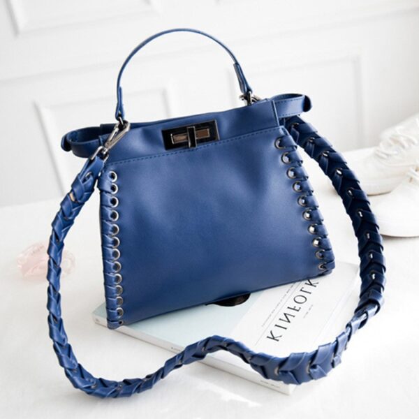 blue leather wovens sleeve bag