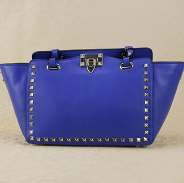 blue studded rivet trapeze sleeve bag