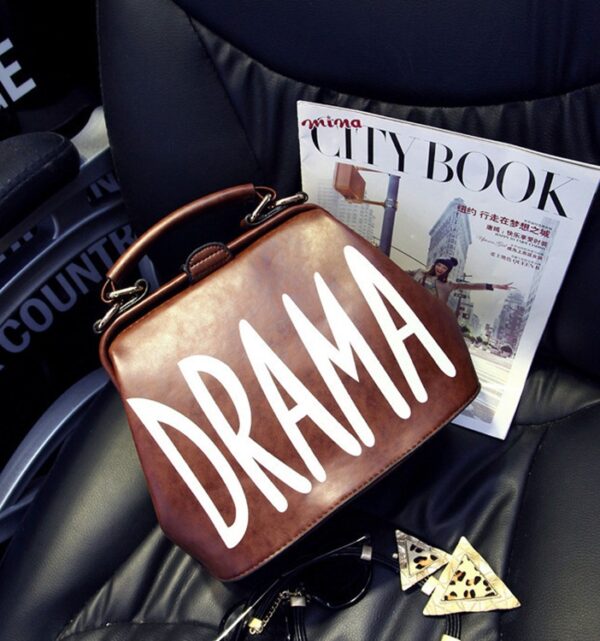 brown dramatic leather bag