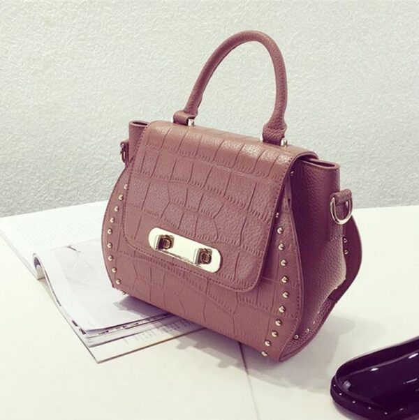 brown embossed leather sleeve bag