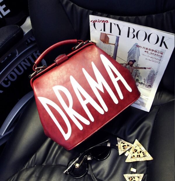 burgundy dramatic leather bag