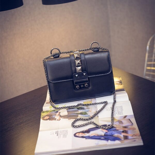 chained studded rivet black cross bag