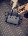 Luxury Embossed Genuine Leather Trapeze Arm Bag