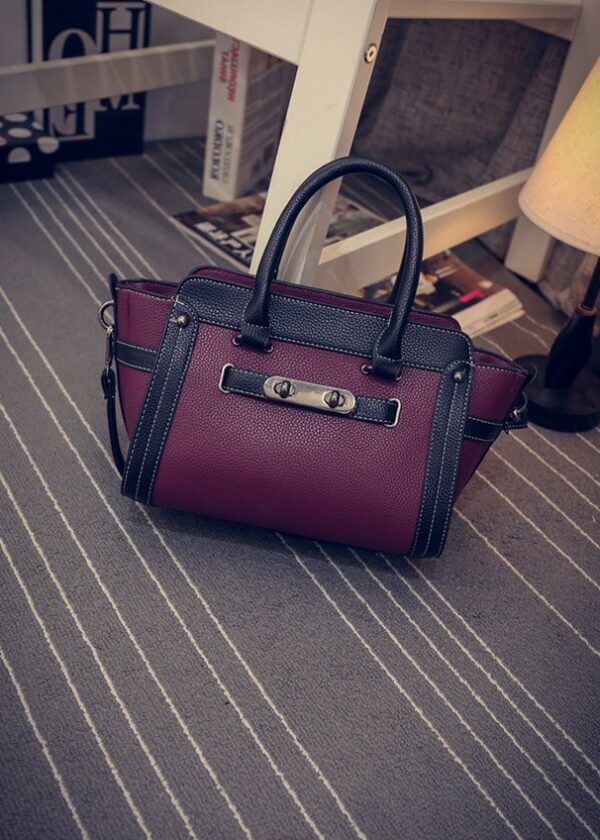 embossed leather black purple sleeve bag