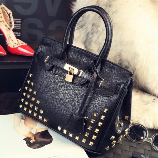 embossed leather black studded rivet bag