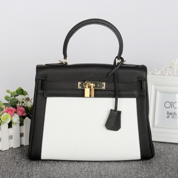 embossed leather black white locked sleeve bag