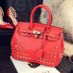 Rebellious Studded Embossed Leather Bag