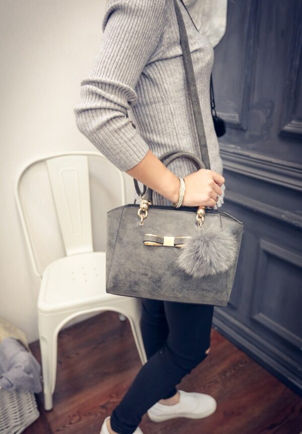 fur embellished gray leather bag