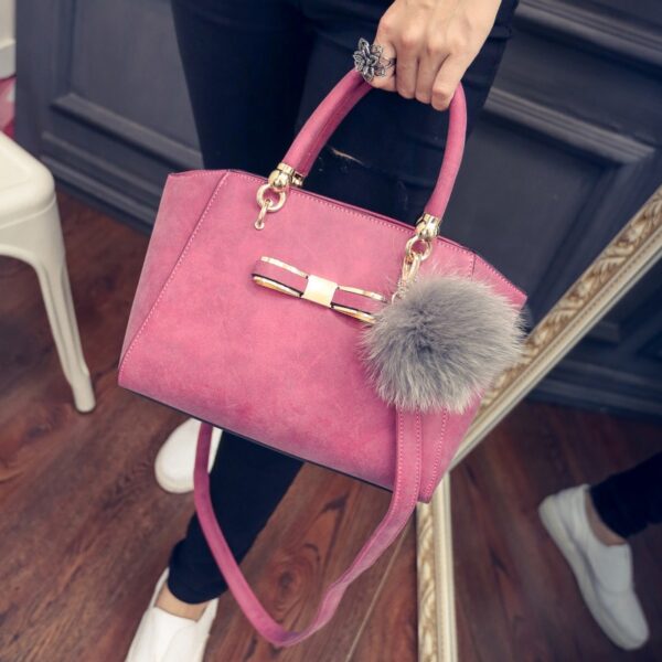 fur embellished pink leather bag