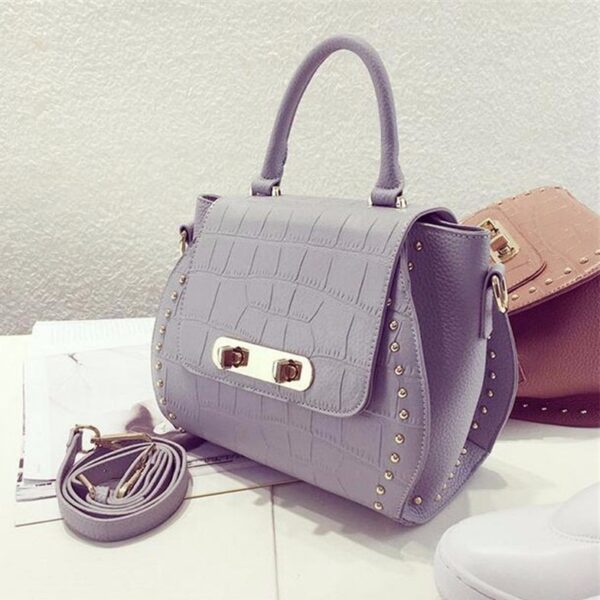gray embossed leather sleeve bag
