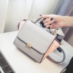 Retro Studded Two-Tone Trapeze Vegan Leather Bag