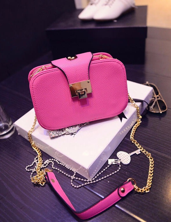 pink chained small hand bag