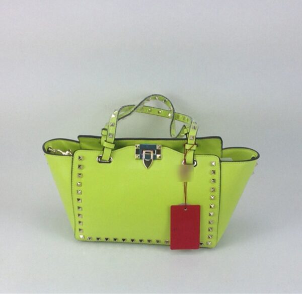 pistachio green studded rivet trapeze sleeve bag