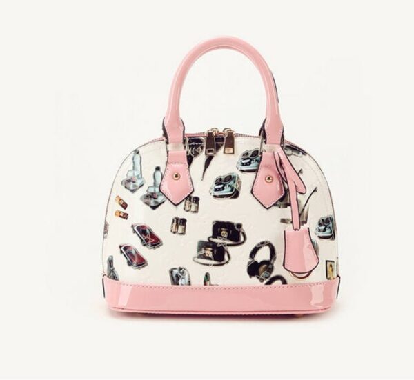 powder nude color cartoon printed patent bag