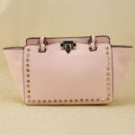 Rock-chic Studded Trapeze Genuine Leather Arm Bag