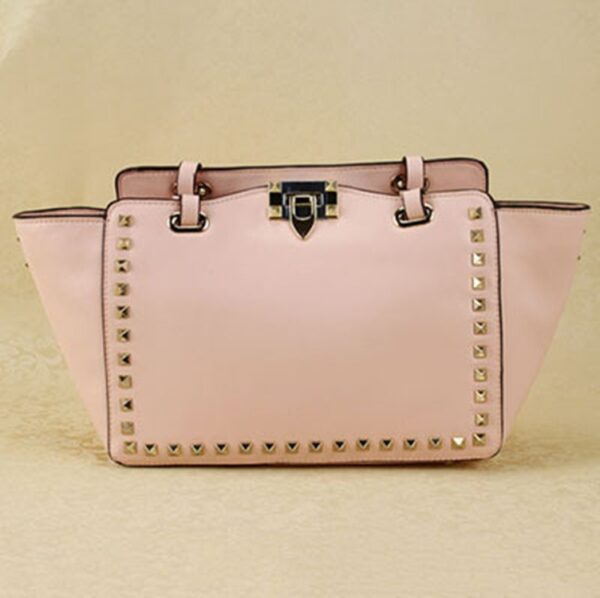 powder nude studded rivet trapeze sleeve bag