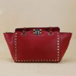 Rock-chic Studded Trapeze Genuine Leather Arm Bag