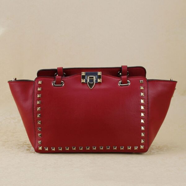 red studded rivet trapeze sleeve bag