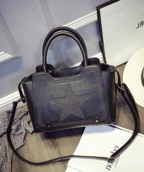 star patterned studded rivet black sleeve bag