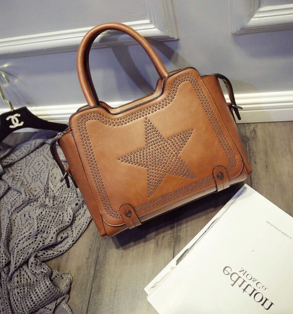 star patterned studded rivet brown sleeve bag