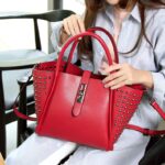 Luxurious Studded Trapeze Top Handle Arm Bag