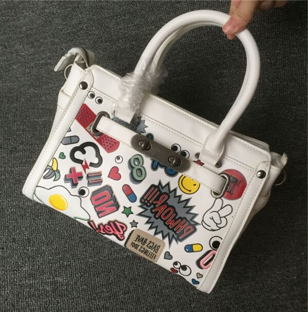white colored cartoon women genuine leather sleeve bag