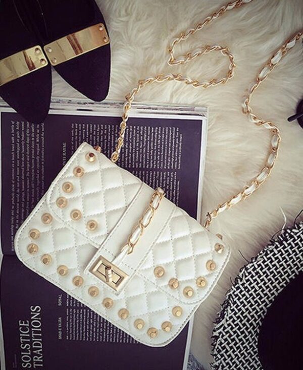 white studded rivet small hand sleeve bag