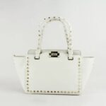 Rock-chic Studded Trapeze Genuine Leather Arm Bag