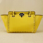 Rock-chic Studded Trapeze Genuine Leather Arm Bag